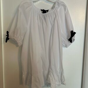 Women’s white blouse with black bows